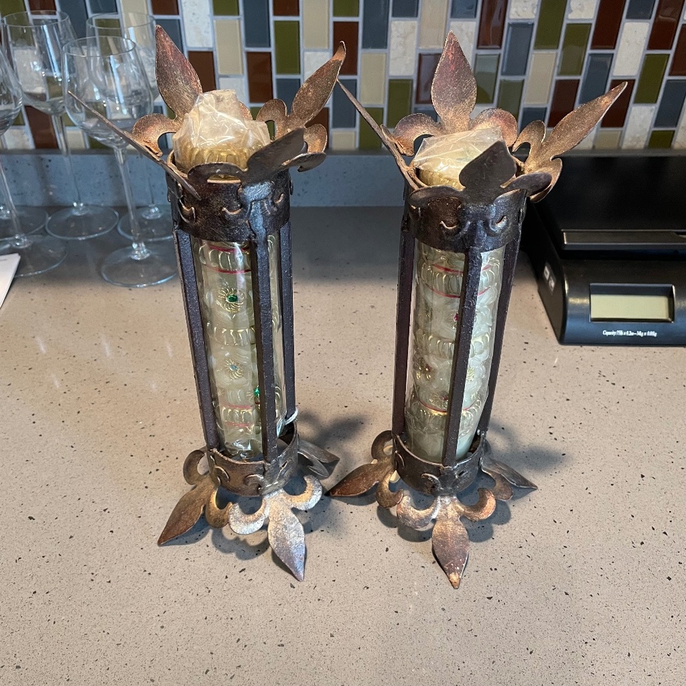 Rare pair of vintage metal candlestick holders and ornate candles